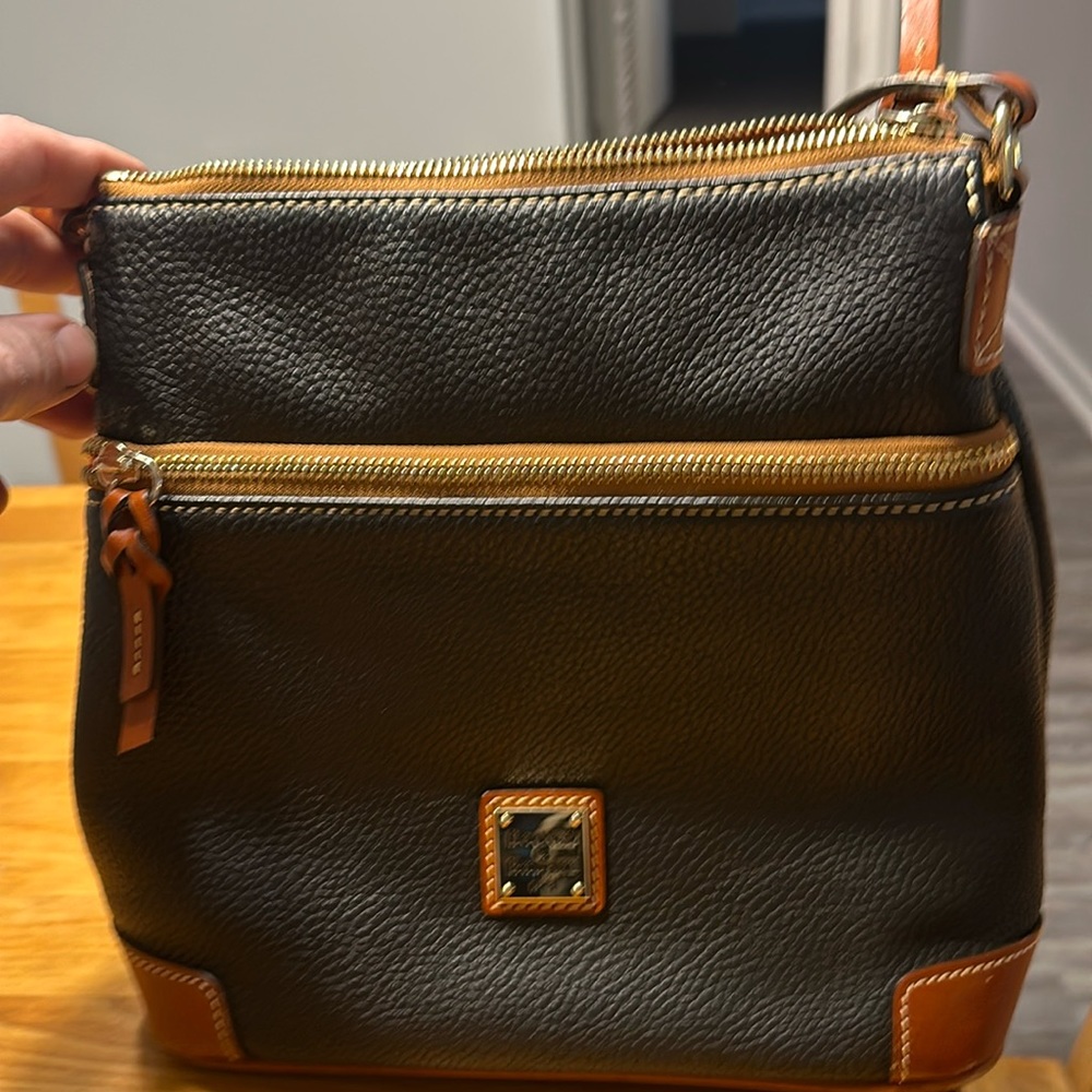 Black Dooney and Bourke purse. Great condition small wear spots on bottom corner